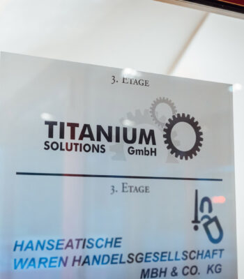 Titanium Solutions logo on the entrance door to the office, Am Wall 127, Bremen.