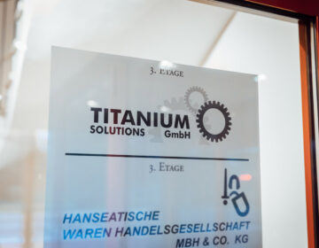 Titanium Solutions logo on the entrance door to the office, Am Wall 127, Bremen.